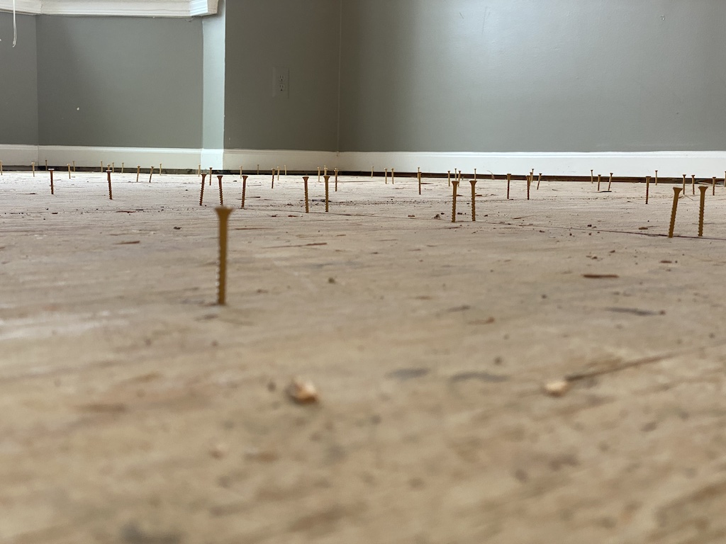 A Remarkable Flooring Transformation: Red Oak Hardwood Elegance by BandO Remodeling